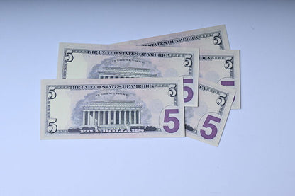 Prop 5 Dollars bills