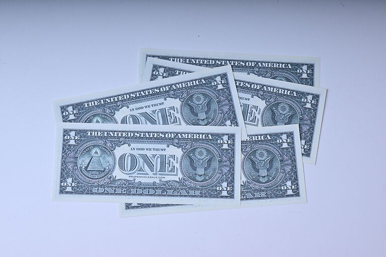 Prop 1 dollar bills
