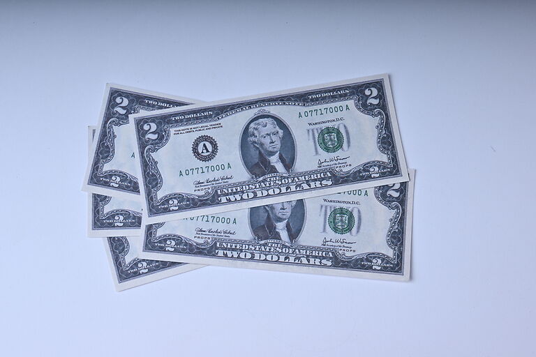 Prop 2 Dollar bills
